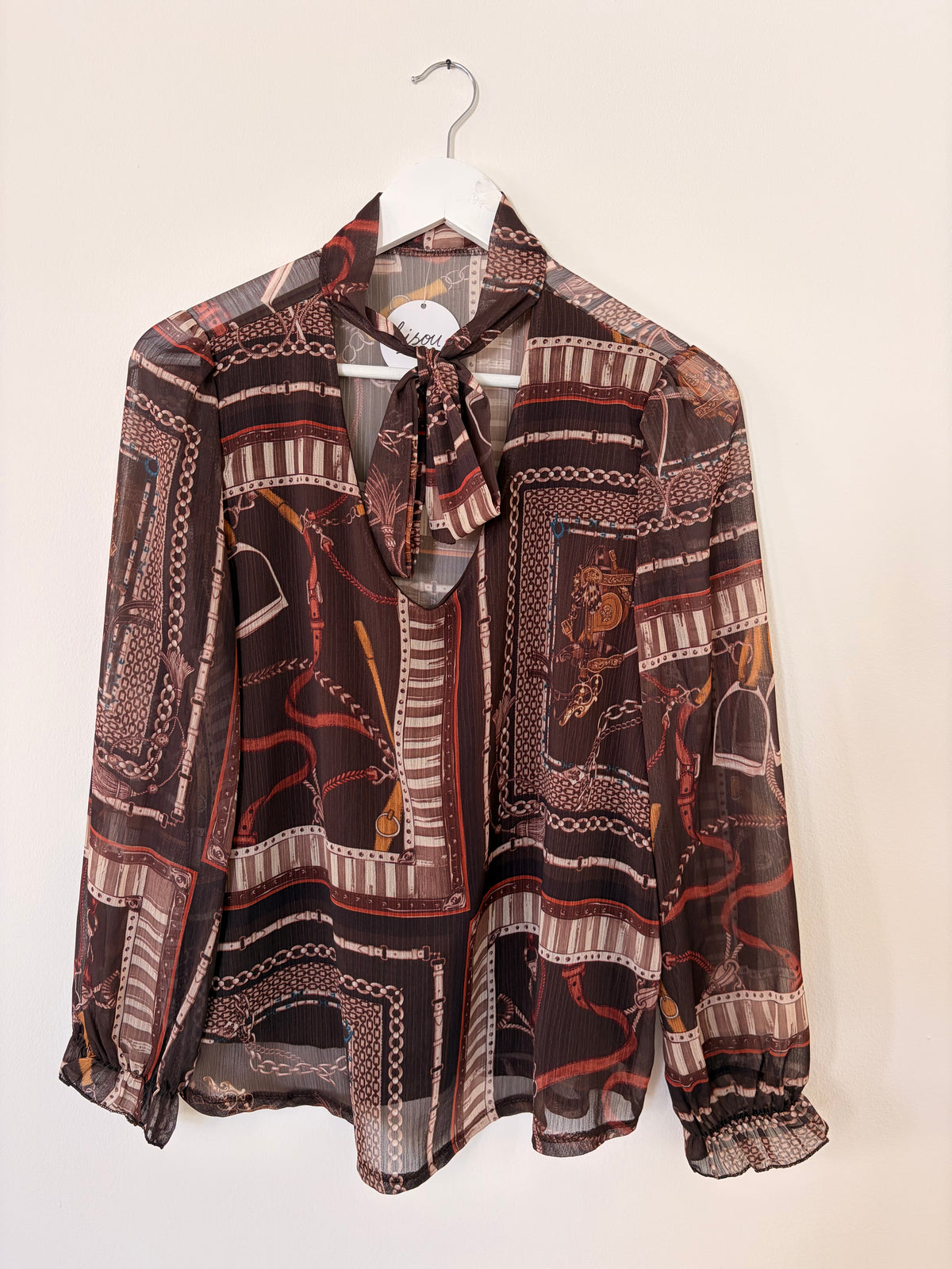 Bluse gemustert mit Schlaufe in div. Farben