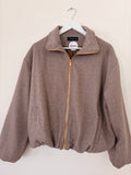 Jacke mit goldenem Reisverschluss